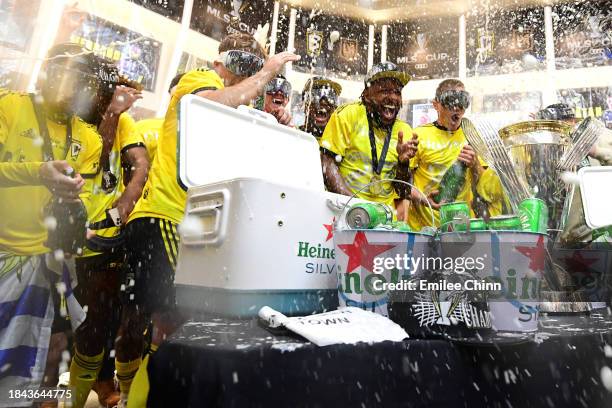 The Columbus Crew celebrate in the locker room after winning the 2023 MLS Cup against the Los Angeles FC at Lower.com Field on December 09, 2023 in...