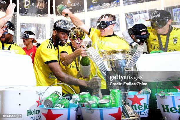 The Columbus Crew celebrate in the locker room after winning the 2023 MLS Cup against the Los Angeles FC at Lower.com Field on December 09, 2023 in...