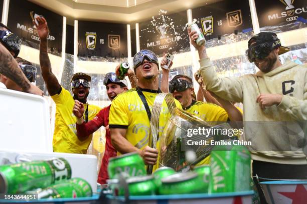 The Columbus Crew celebrate in the locker room after winning the 2023 MLS Cup against the Los Angeles FC at Lower.com Field on December 09, 2023 in...