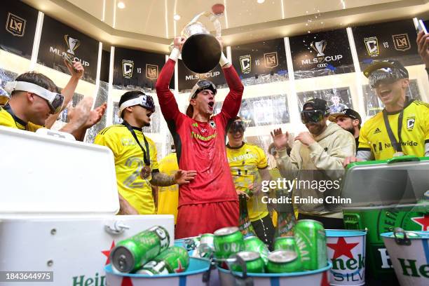 Patrick Schulte of Columbus Crew holds up the Philip F. Anschutz Trophy after winning the 2023 MLS Cup against the Los Angeles FC at Lower.com Field...