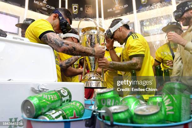 The Columbus Crew celebrate in the locker room after winning the 2023 MLS Cup against the Los Angeles FC at Lower.com Field on December 09, 2023 in...