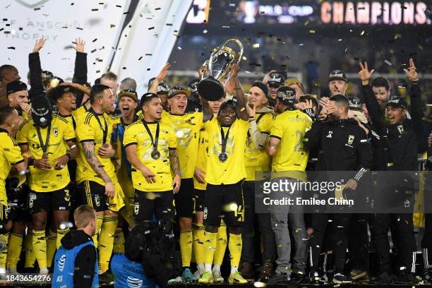 Yaw Yeboah of Columbus Crew holds up the Philip F. Anschutz Trophy after winning the 2023 MLS Cup against the Los Angeles FC at Lower.com Field on...
