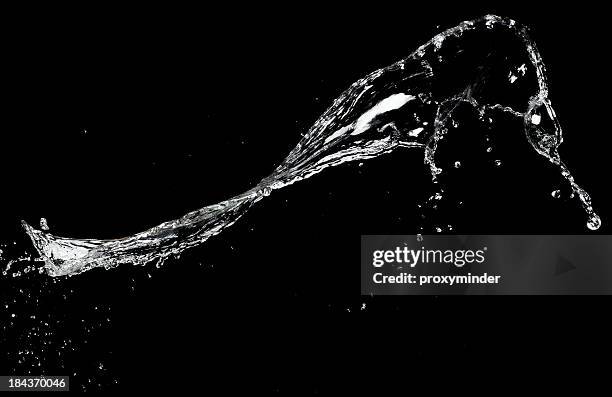 water splash on black - splash stock pictures, royalty-free photos & images