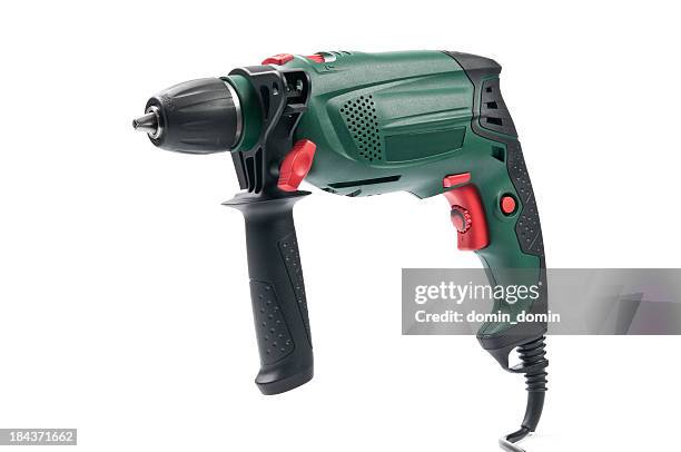 electric drill with two handles isolated on white, studio shot - drill stockfoto's en -beelden