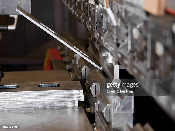 cnc industrial brake press in use - sheet metal stock pictures, royalty-free photos & images