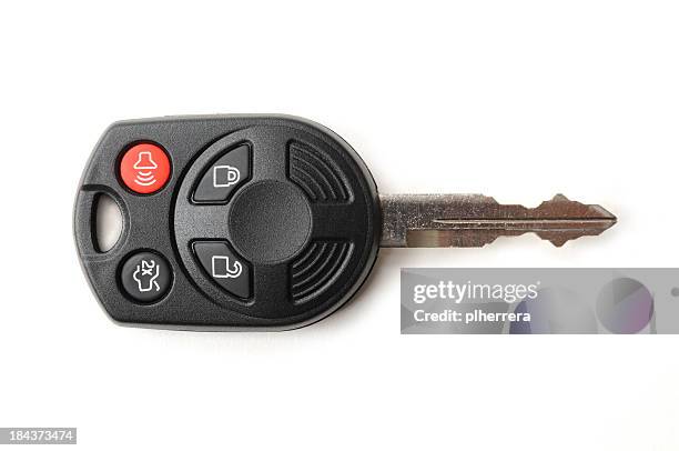 automotive remote key on white - car keys stock pictures, royalty-free photos & images