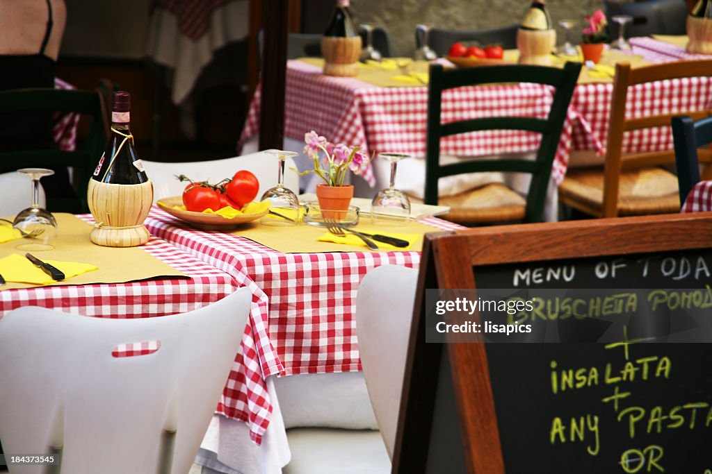 Neatly presented tables in an Italian restaurant