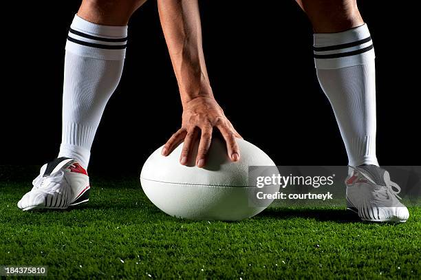 close up of a man playing rugby ball - conversion sport stockfoto's en -beelden