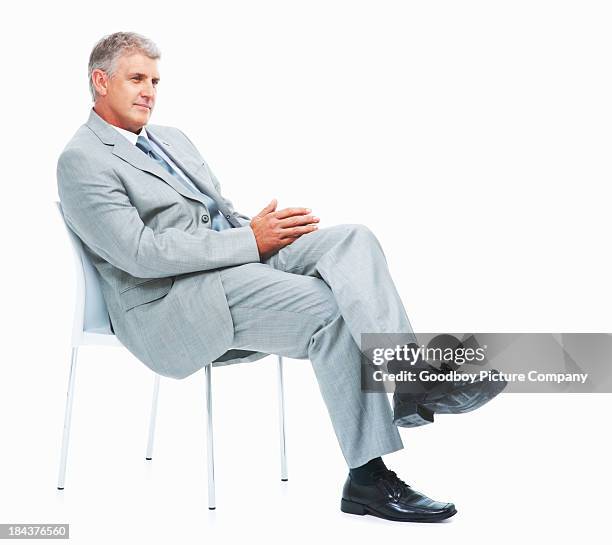 relaxed executive on chair - chair isolated stock pictures, royalty-free photos & images