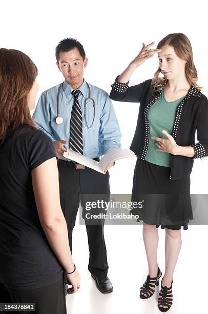 sign language interpreter and patient with asian doctor - group of people using sign language stock pictures, royalty-free photos & images