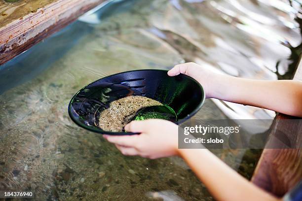 panning for gold - gold rush stock pictures, royalty-free photos & images