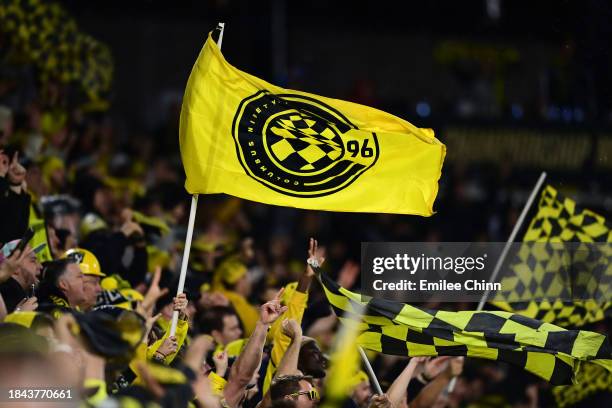 Columbus Crew fans wave flags during the second half against the Los Angeles FC during the 2023 MLS Cup at Lower.com Field on December 09, 2023 in...