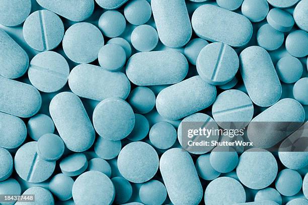 medicine pills - tablets stock pictures, royalty-free photos & images