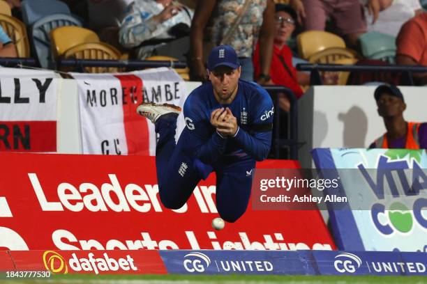 Liam Livingstone of England drops Romario Shepherd of West Indies during the third CG United One Day International match between West Indies and...