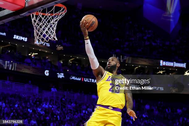 LeBron James of the Los Angeles Lakers makes a lay up against the Indiana Pacers during the first quarter of the championship game of the inaugural...