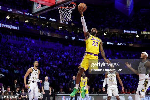 LeBron James of the Los Angeles Lakers makes a lay up against the Indiana Pacers during the first quarter of the championship game of the inaugural...