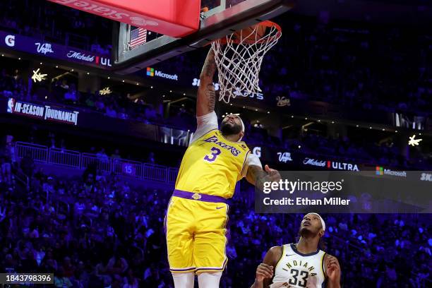 Anthony Davis of the Los Angeles Lakers dunks the ball against the Indiana Pacers during the first quarter in the championship game of the inaugural...