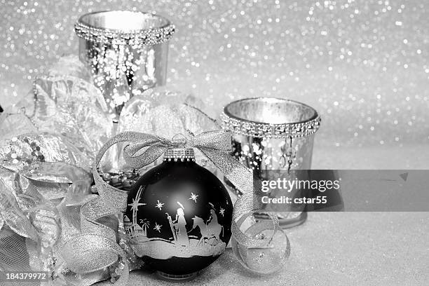 religious: black and silver christmas nativity scene ornament - black madonna stock pictures, royalty-free photos & images