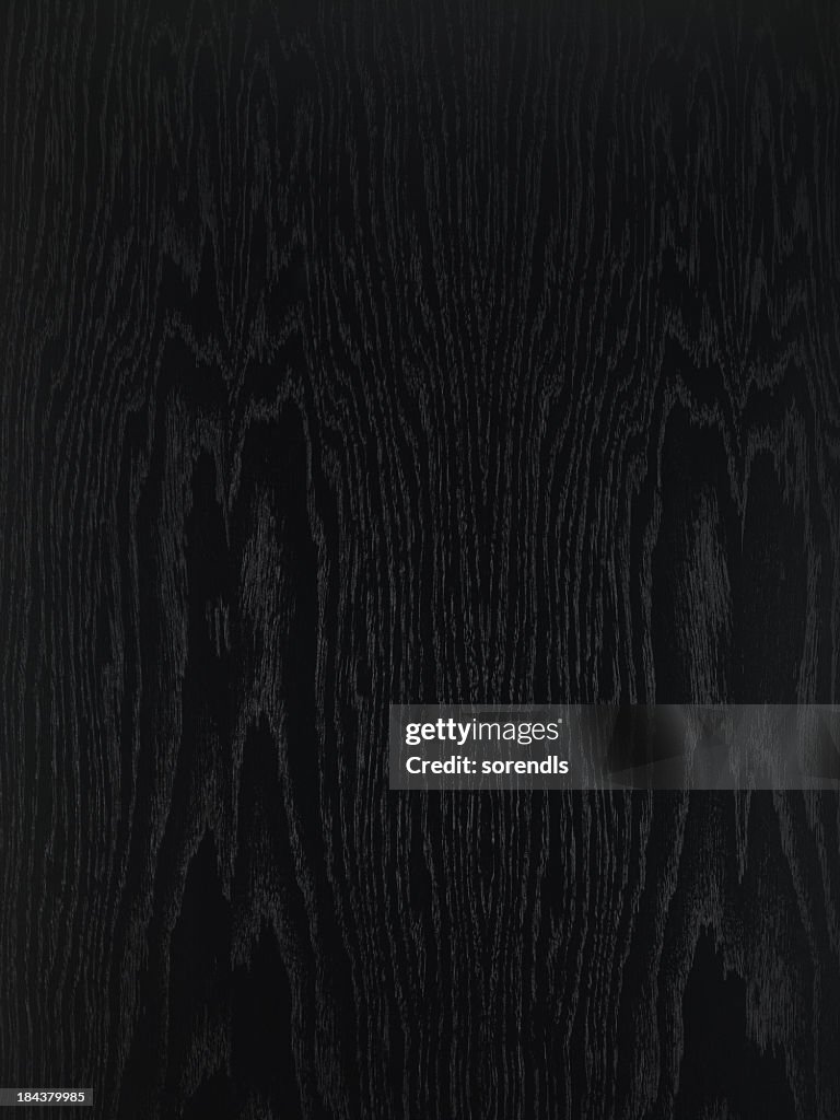 Overhead view of black wooden table