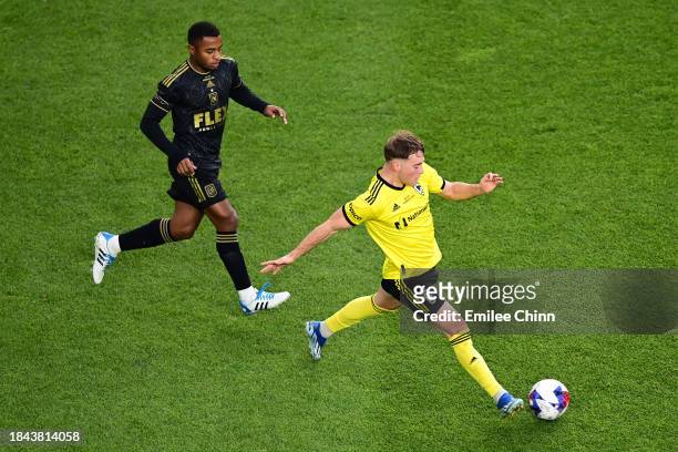 Aidan Morris of Columbus Crew controls the ball while defended by Diego Palacios of Los Angeles FC during the first half during the 2023 MLS Cup at...