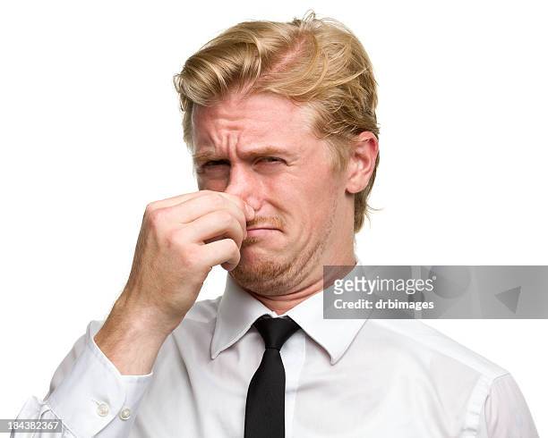 男性のポートレート - 鼻をつまむ ストックフォトと画像