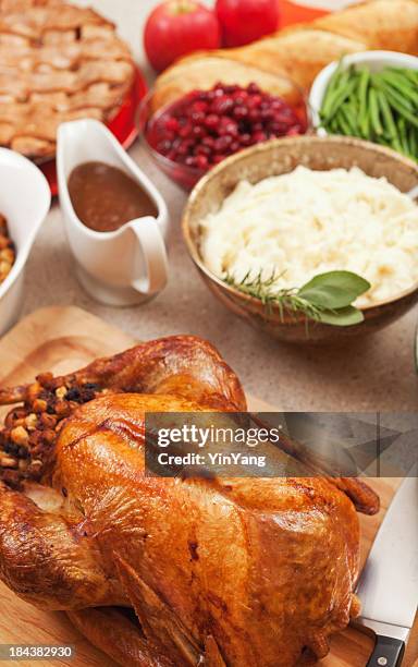 thanksgiving roast turkey dinner, holiday party meal celebrating food abundance - side dish stock pictures, royalty-free photos & images