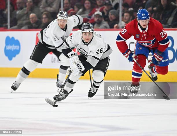 Blake Lizotte of the Los Angeles Kings skates the puck during the third period against the Montreal Canadiens at the Bell Centre on December 7, 2023...