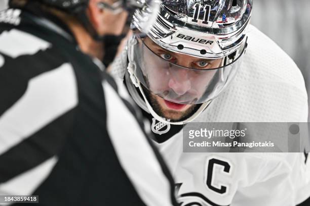 Anze Kopitar of the Los Angeles Kings prepares to take a faceoff during the third period against the Montreal Canadiens at the Bell Centre on...