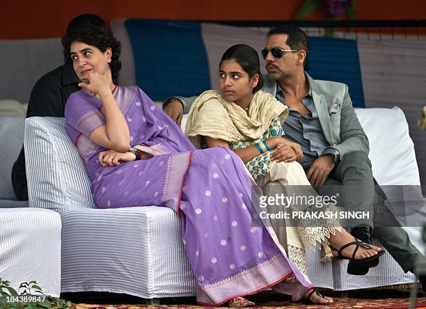 Priyanka Gandhi Vadra , the daughter of Indian Congress Party president and chairperson of the United Progressive Alliance Sonia Gandhi, looks on...