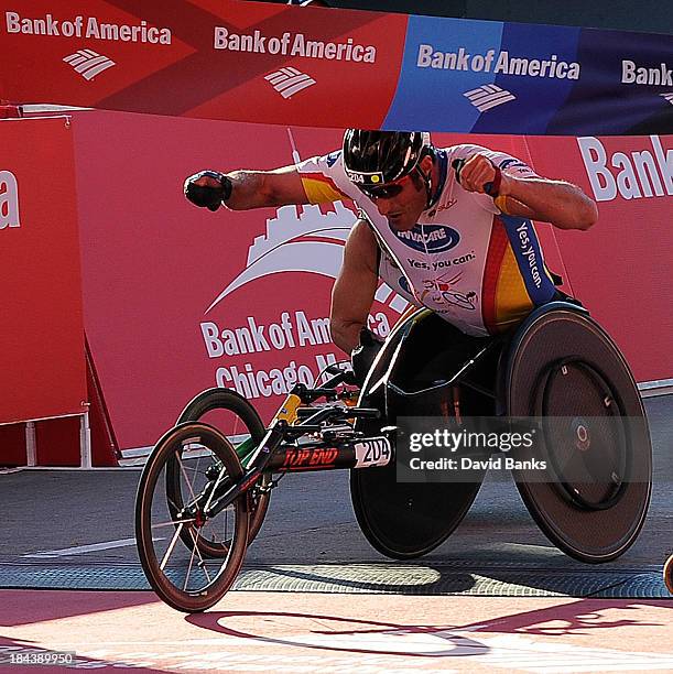 Ernst Van Dyk wins the men's wheelchair race in the 2013 Bank of America Chicago Marathon on October 13, 2013 in Chicago, Illinois.