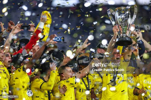 Christian Ramirez of Columbus Crew holds up the Philip F. Anschutz Trophy after winning the 2023 MLS Cup against the Los Angeles FC at Lower.com...