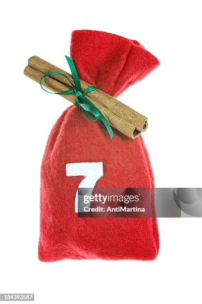 red christmas bag for advent calendar isolated on white - adventkalender stock pictures, royalty-free photos & images