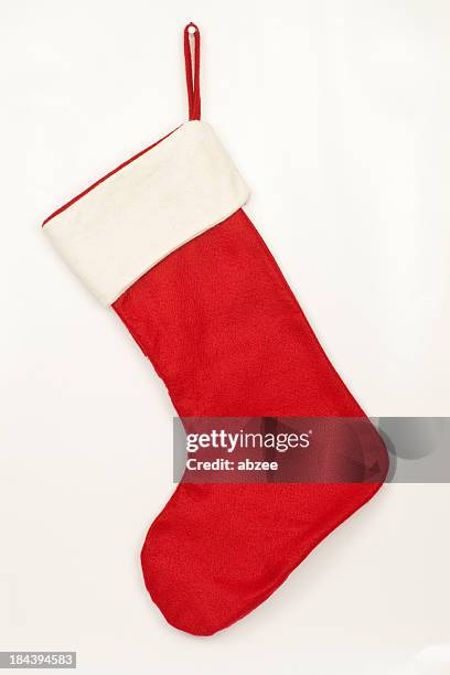 christmas stocking with shadow on white background - stockings stockfoto's en -beelden