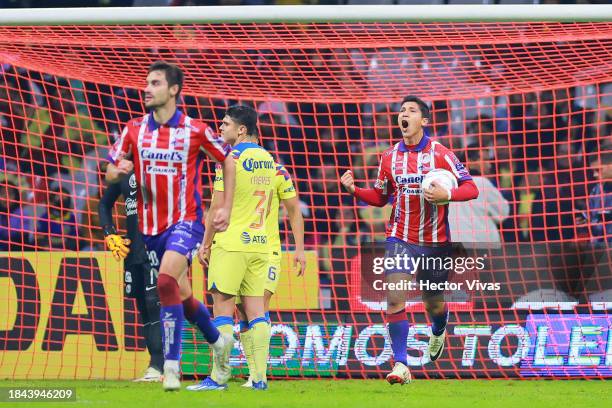 Angel Zaldivar of Atletico San Luis celebrates with teammates after scoring the team's second goal during the semifinals second leg match between...
