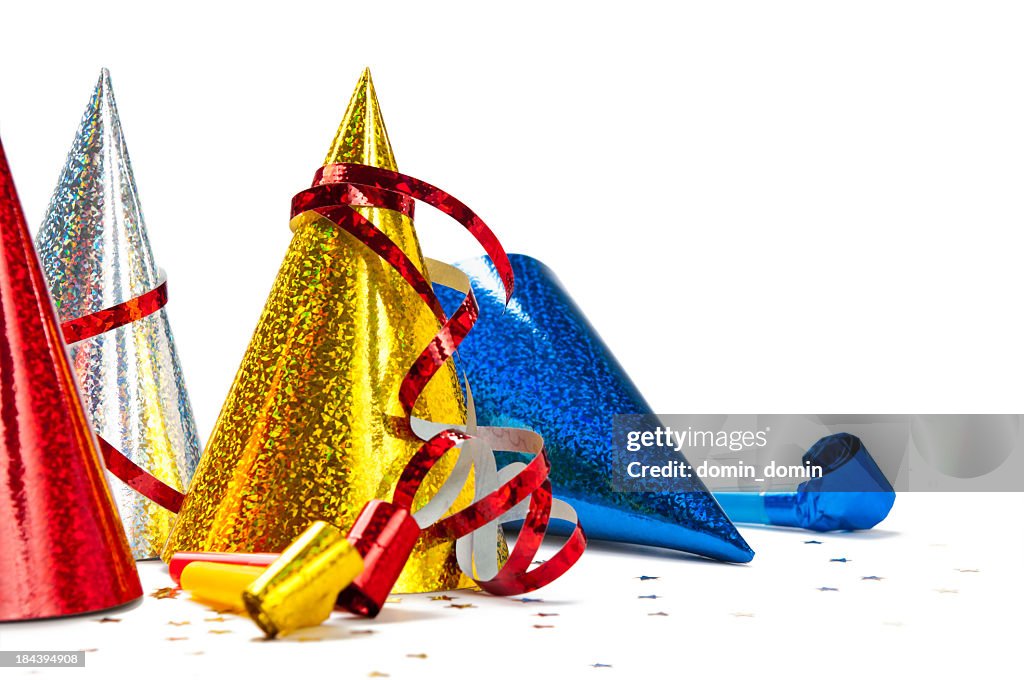 Close-up of multicoloured Party Hats isolated on white background