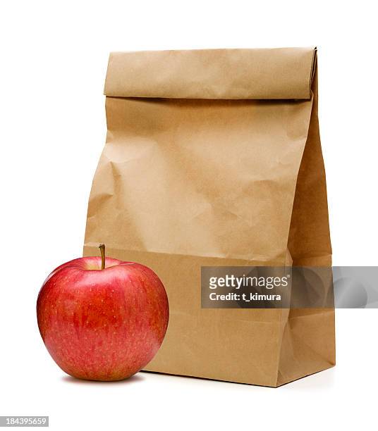 brown paper bag and apple - lunch bag white background stock pictures, royalty-free photos & images