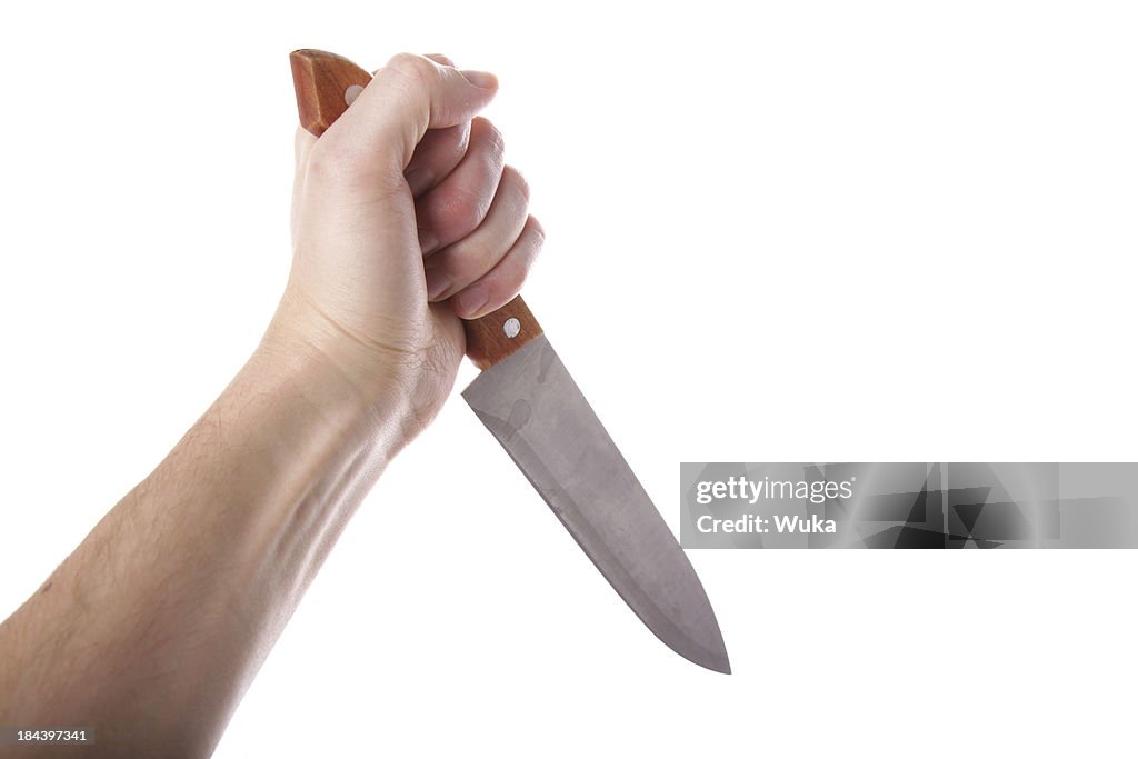 Hand holding knife