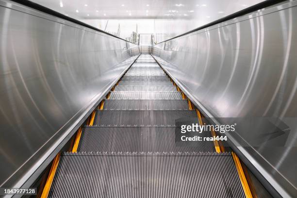 modern luxury escalators - elevetor photo stock pictures, royalty-free photos & images