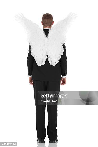 businessman with artificial wing - man angel wings stock pictures, royalty-free photos & images