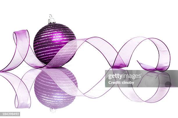 purple christmas bauble reflection - christmas decorations isolated stock pictures, royalty-free photos & images