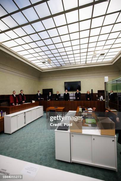 The presiding judge Detlev Schmidt and colleagues and prosecutors Lars Malskies and Cai Rueffer stand inside the court room prior to the beginning of...