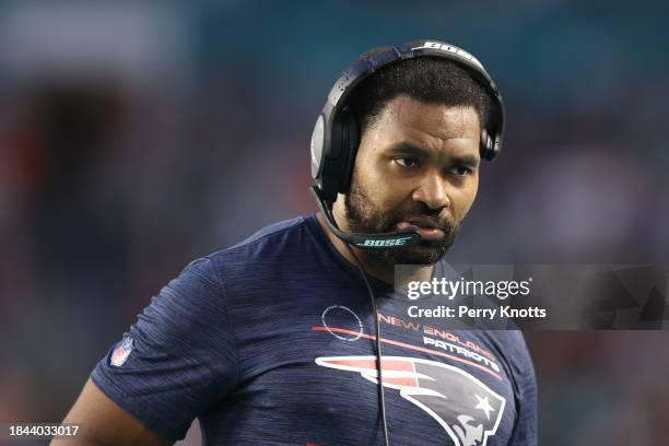 New England Patriots insider linebackers coach Jerod Mayo stands on the sideline against the Miami Dolphins prior to the game at Hard Rock Stadium on...