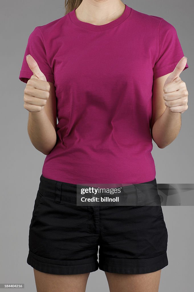 Young woman posing with blank purple shirt