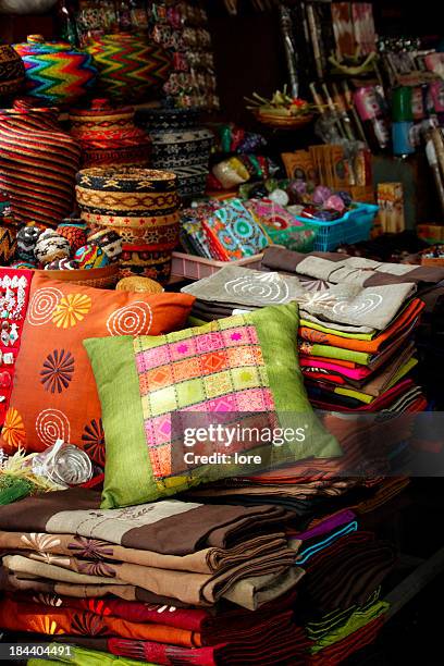 pillows and trinkets and the ubud market - batik indonesia stock pictures, royalty-free photos & images