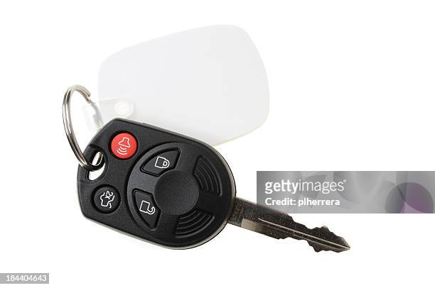 automotive remote key on white - sleutelring stockfoto's en -beelden