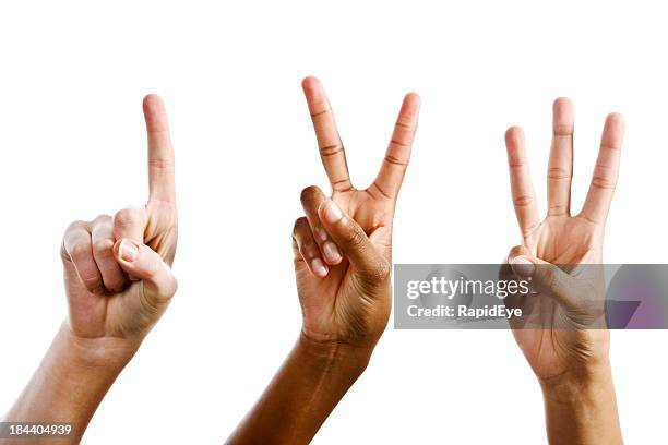 easy as 1,2,3! hands counting against white - third stock pictures, royalty-free photos & images