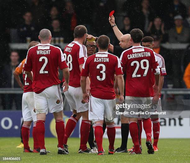 Barnet player manager Edgar Davids and Stephen Wright of Wrexham are both sent off by referee Nick Kinseley after Edgar Davids elbowed Stephen Wright...