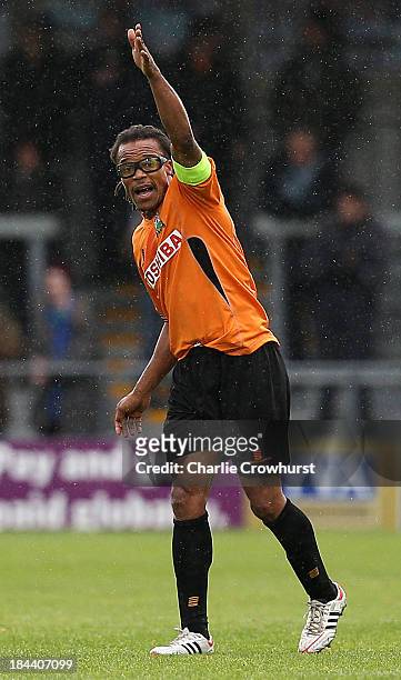 Barnet player manager Edgar Davids directs his team on the pitch during the Skrill Conference Premier match between Barnet and Wrexham AFC at The...