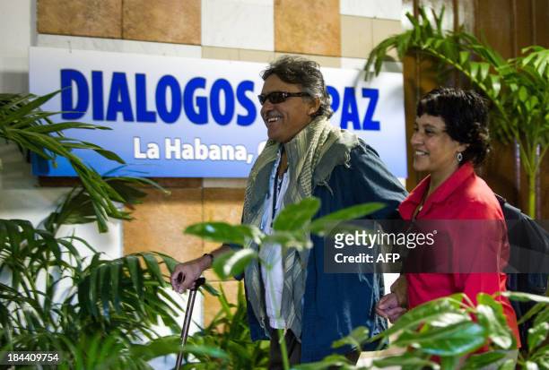 Commander of the FARC-EP leftist guerrillas Jesus Santrich , and Maritza Garcia arrive at Convention Palace in Havana for the peace talks with the...