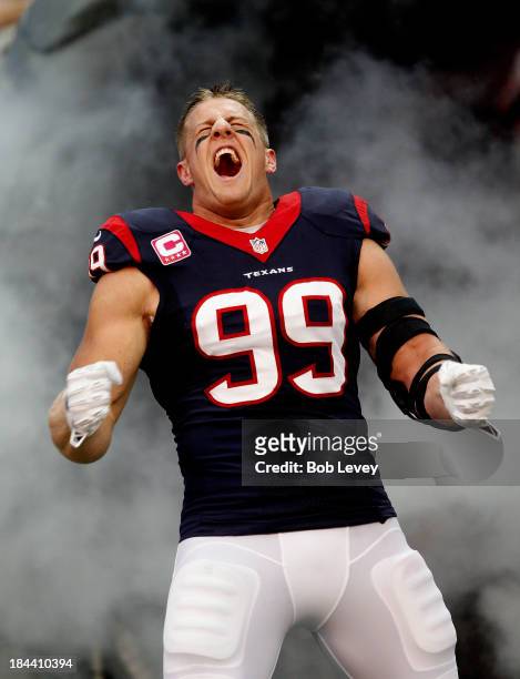 Watt of the Houston Texans is introduced to the crowd at Reliant Stadium on October 13, 2013 in Houston, Texas.